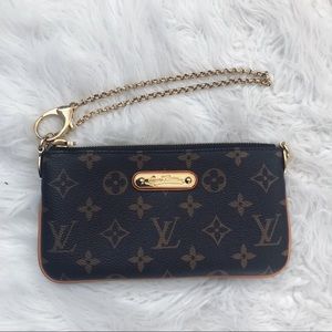 Louis Vuitton Mila Clutch